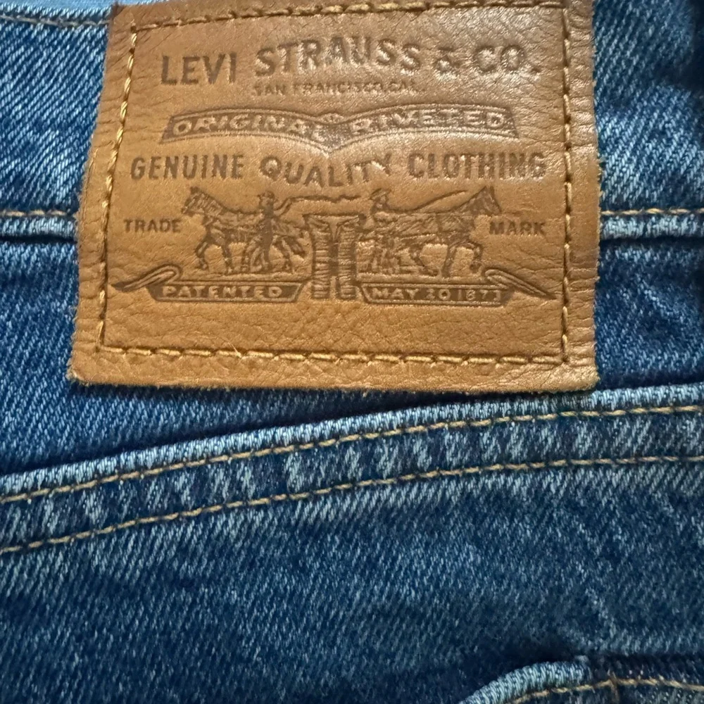 Upcycled Grommet design button fly Levi’s size 28